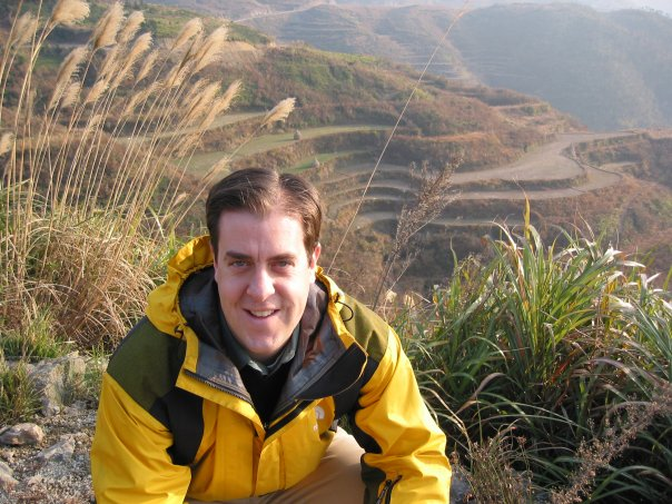 Bill Bucklew smiling on a hike