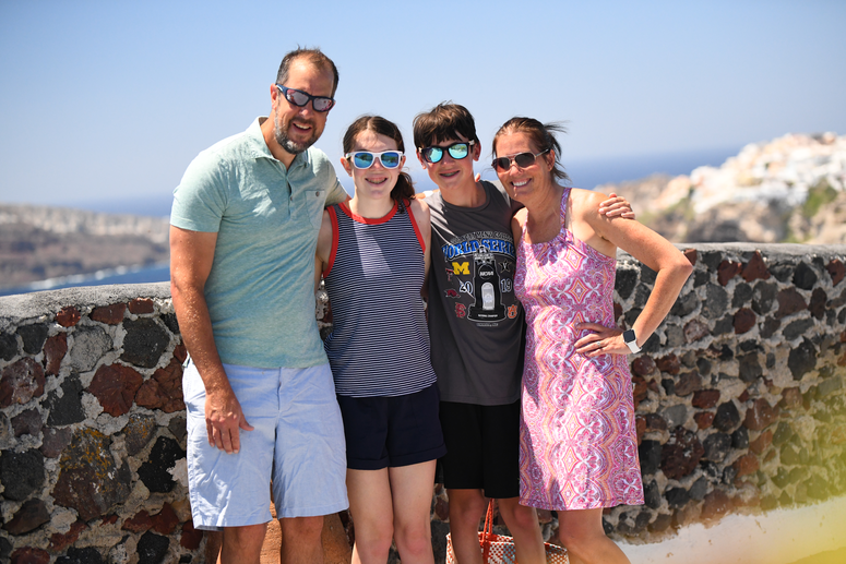 Bill Bucklew and family smiling on vacation