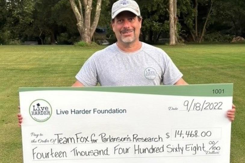 David and a check for Live Harder