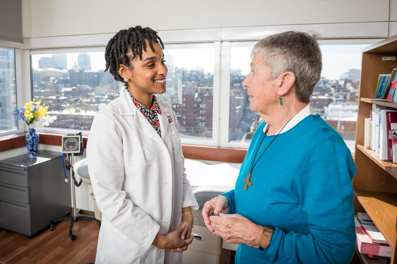 Health care professional and person in a room