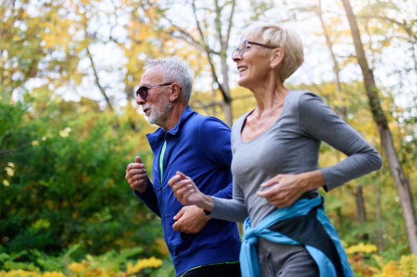 couple jogging in the forest