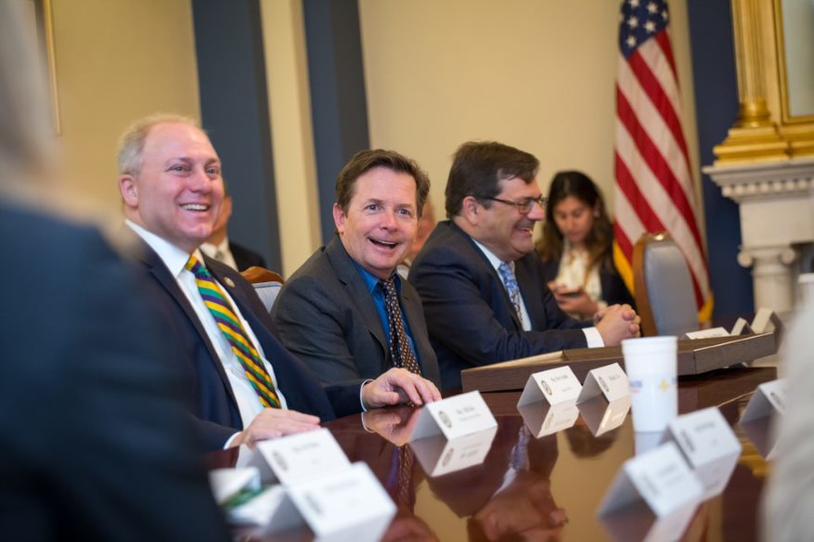 People sitting around table at Capitol Hill.