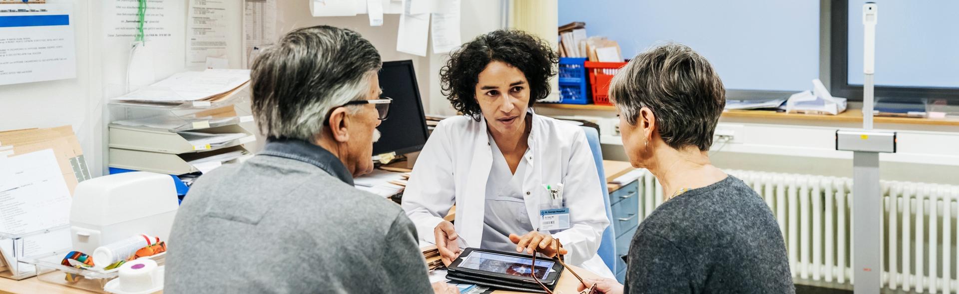 People talking in a doctor's office