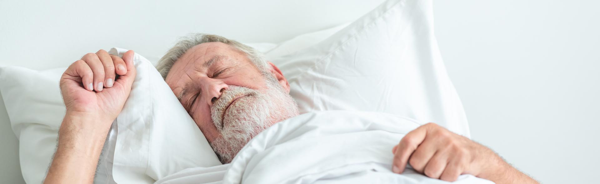 Man sleeping in bed