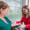 Woman giving blood in a clinic.